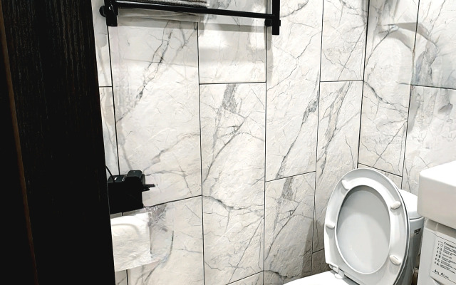 Апартаменты Уютная студия напротив университета и парка в центре Нефтяников