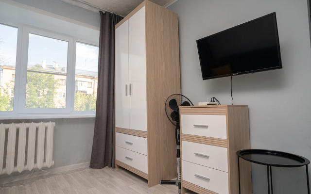v Tikhom Meste Ryadom s Glavnymi Ulitsami Goroda Apartments