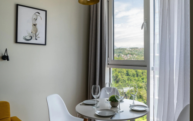 Апартаменты Уютная студия с дизайнерским ремонтом