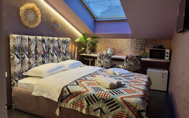 Апартаменты Мансарда