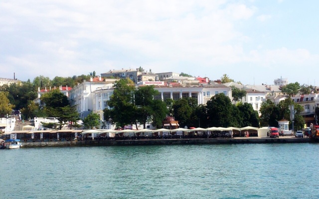V Tsentre Goroda Apartments