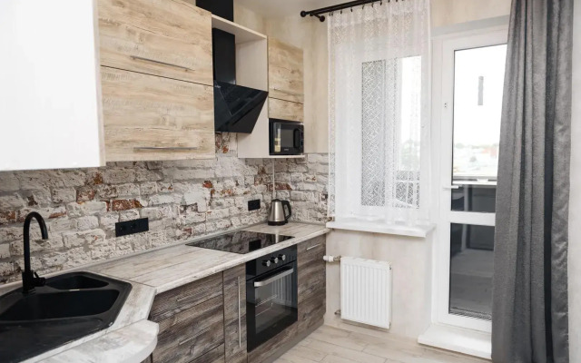 Na Ulitse Kurchatova 22 Apartments