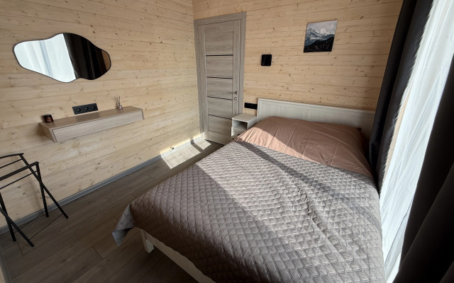 Na Granitse S Lesom Private House