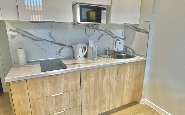 Apartament Green v Rezidentsii Baykalskiye Kholmy