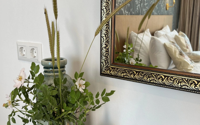 Апартаменты Легенда с зоной патио и отдельной спальней