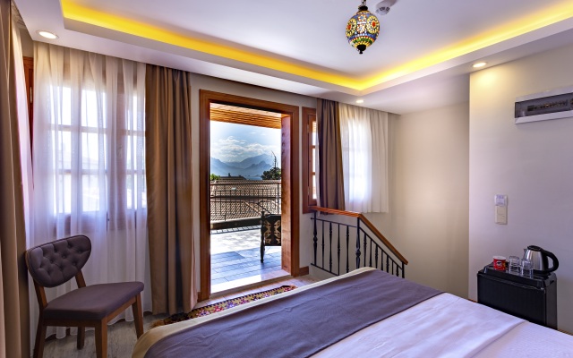 Отель WOO Town Suites