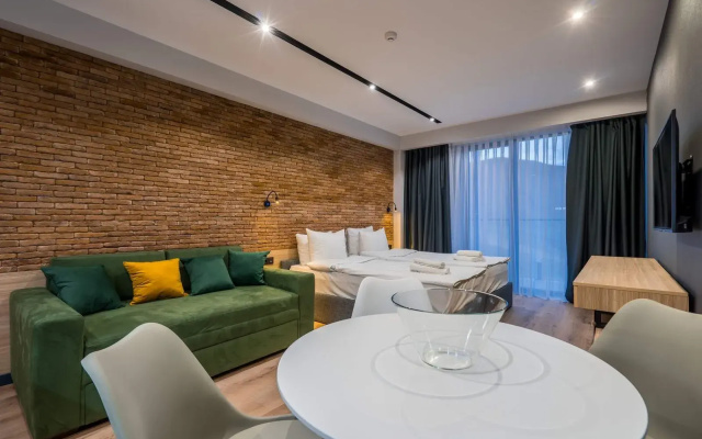 Апарт-отель New Gudauri Atrium Modern Apartments with Ski in/out