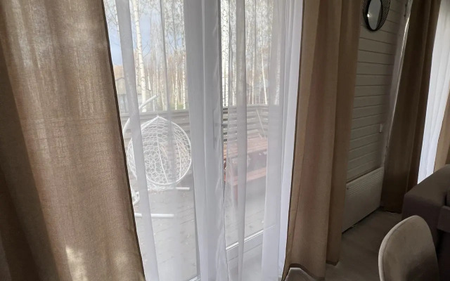 V Poselke U Vodokhranilischa Private house