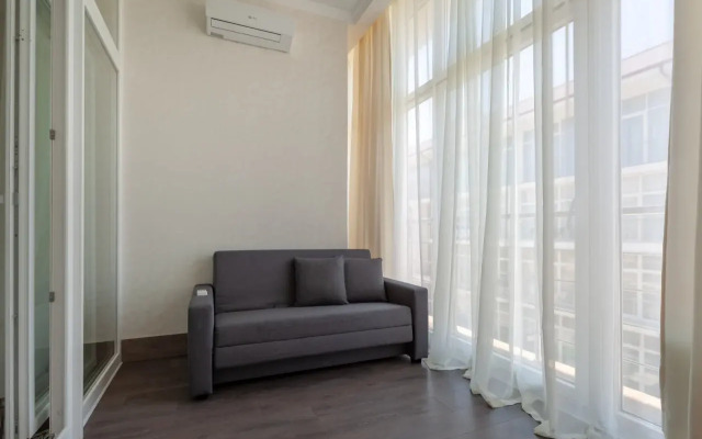 Vmestitel'naya s vidom na more s televizorom v kazhdoy komnate i razdel'nym sanuzlom Flat