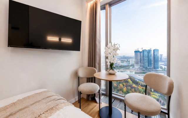 Апартаменты Уникальная панорамная студия с видом на Москва-Сити