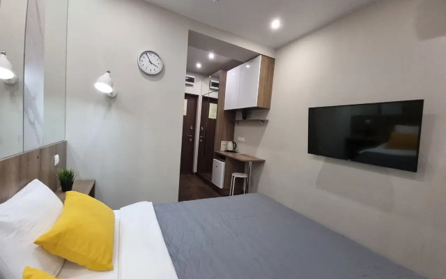 V Tsentre Goroda Apartments