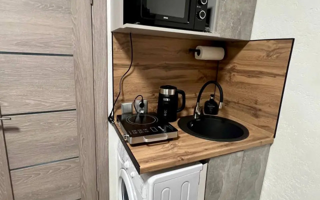 Апартаменты Стильная и уютная студия в центре города