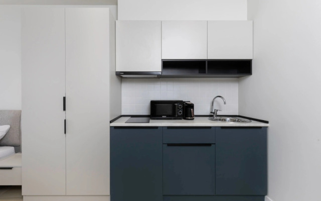 Next Apartments
