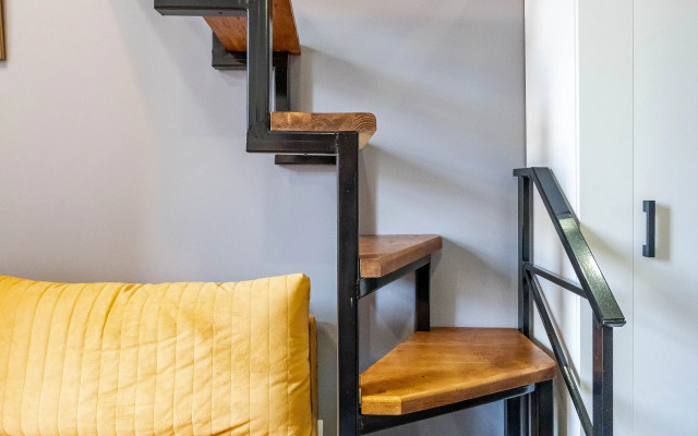 Апартаменты Уютная Двухуровневая Квартира Студия в Центре Города