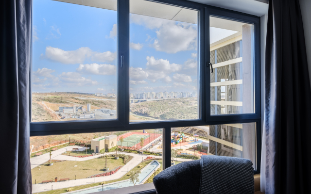 Grand Residence by NewInn Apartments
