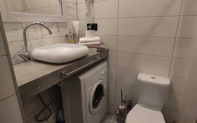 V Tsentre Goroda Apartments