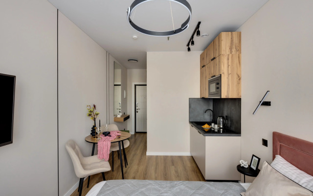 Апартаменты Уютная Дизайнерская Студия у Метро Ботанический Сад