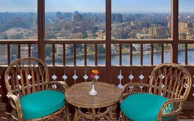 Отель Cairo World Trade Center Hotel & Residences