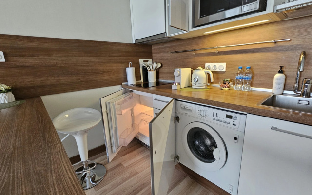 Апартаменты Стильная студия Riva на 12 этаже