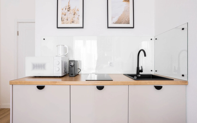 Апартаменты Уютная студия у залива