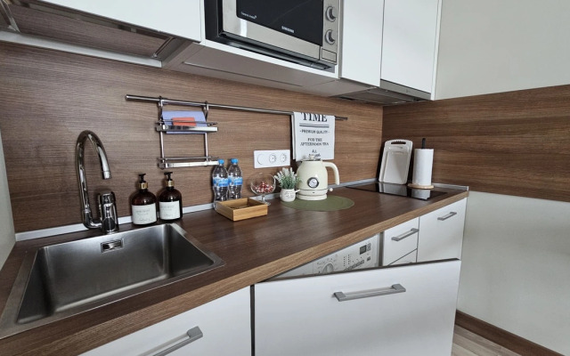 Апартаменты Стильная студия Riva на 14 этаже