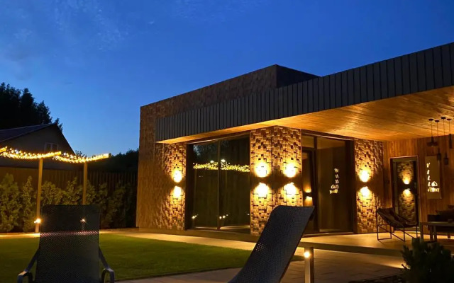 Вилла стильная с умным домом сауной и чаном