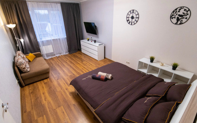 V otlichnom rayone na troikh Apartments