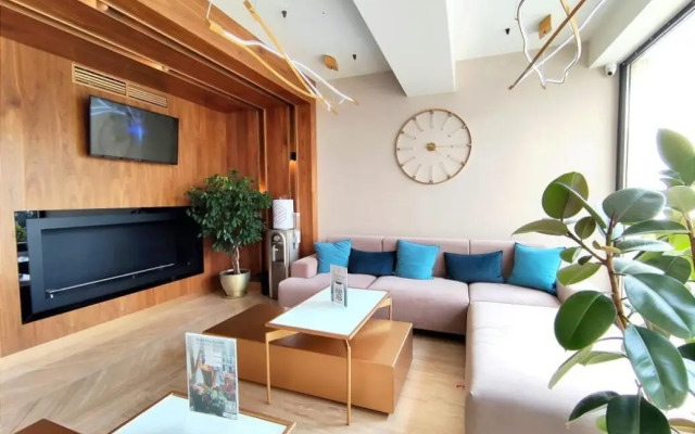 s Balkonom Apartments