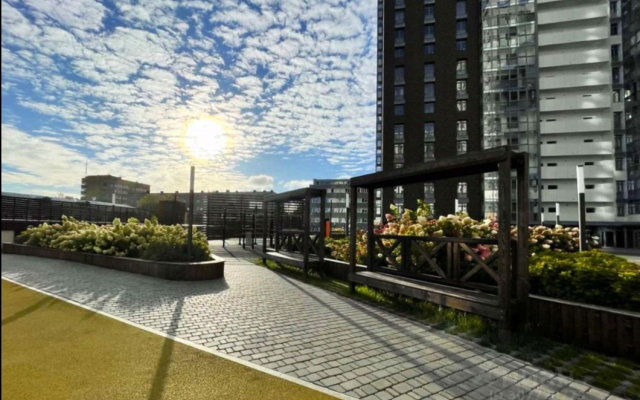 V Novom Dome Ostrovskogo 52 Flat