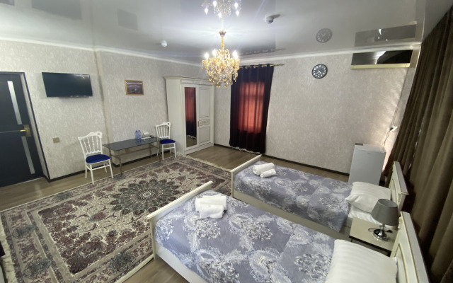 Отель Hotel Uzbegim