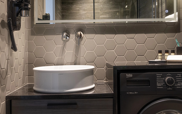 V chetirehzvezdochnom otele Blanc Hill Apartment