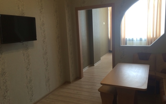 V Tsentre Goroda Apartments