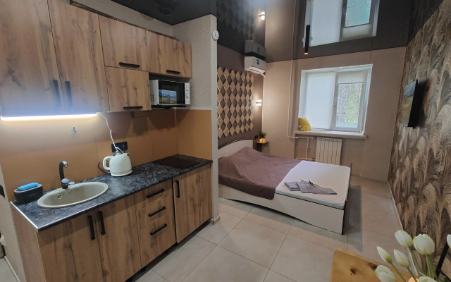 Апартаменты Уютная студия напротив университета и парка в центре Нефтяников