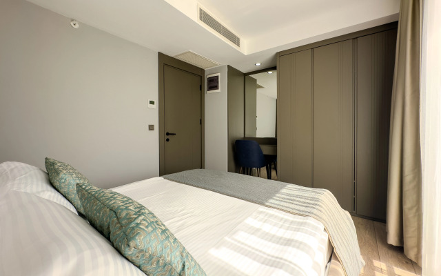 Отель Leaf River Suites