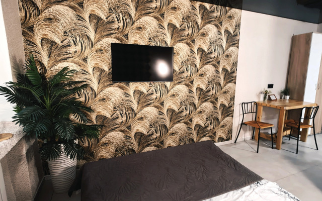 Апартаменты Уютная студия напротив университета и парка в центре Нефтяников