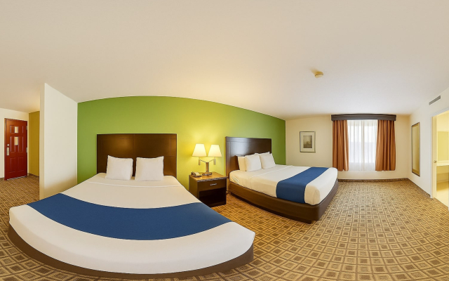 Отель Coratel Plus Suites Wichita West Airport