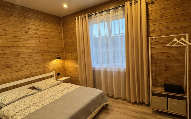 Domik v Derevne u Lesa Private house