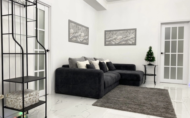 V Tsentre Kurorta S 3 Spalnyami Apartments