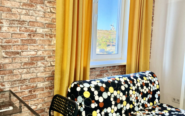 Квартира Уютная студия с видом на Мамаев курган