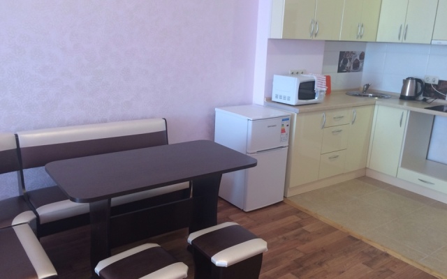 V Tsentre Goroda Apartments