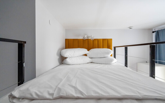 Апартаменты Уютная Двухуровневая Квартира Студия в Центре Города