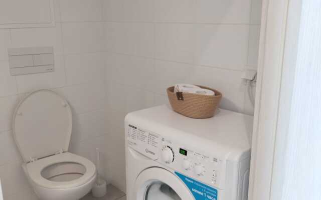 Na Ulitse Usadebny Park 1 Apartments