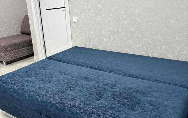V Tsentre Goroda Apartments
