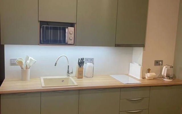 Апартаменты на Набережной 75 (213А)