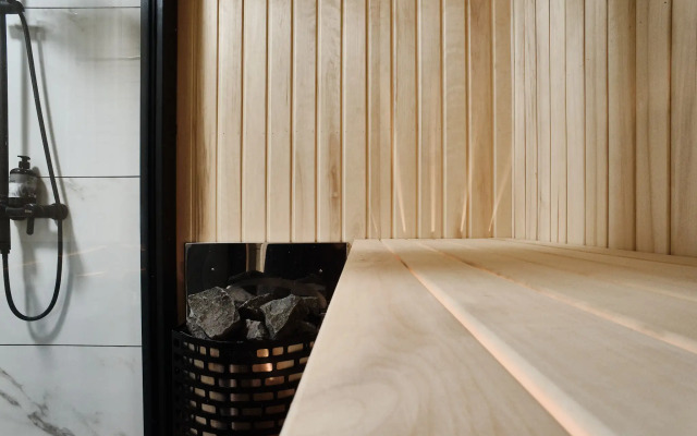 Частный дом с сауной, детской и спортивной площадкой