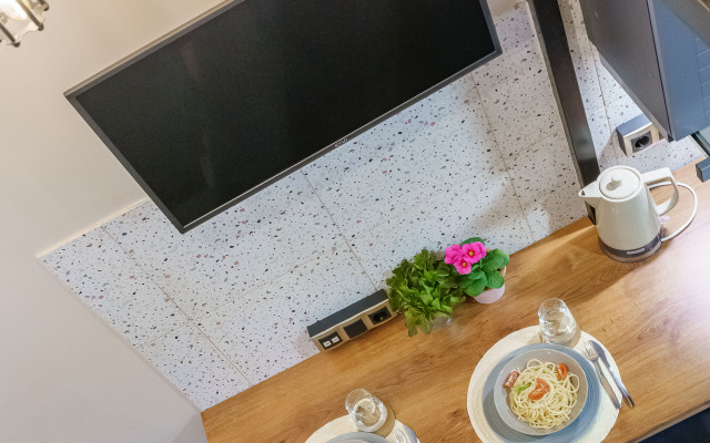 Апартаменты Alpine Urban Garden 1