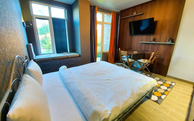 Апартаменты Уютная студия у Олимпийского парка