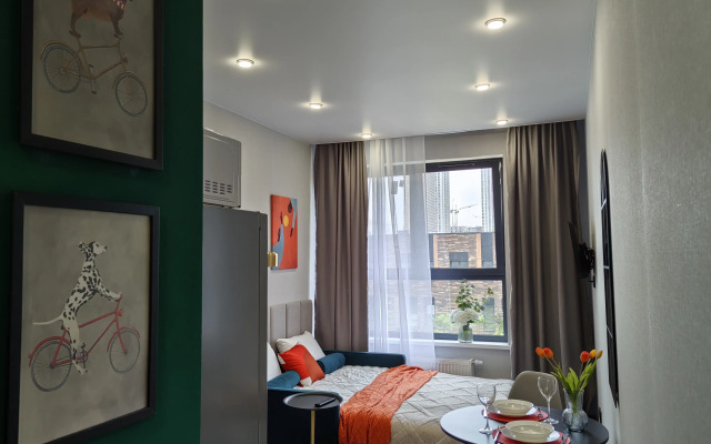 Квартира Яркая студия в 4 минутах от метро. Бесконтактное заселение