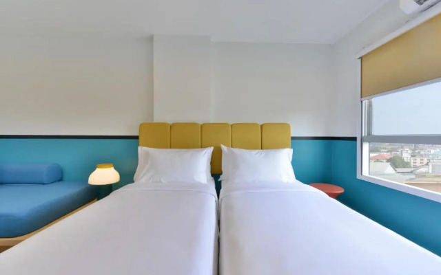 Отель The Grass Serviced Suites