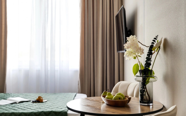 Апартаменты Уютная Студия у Метро Ботанический Сад